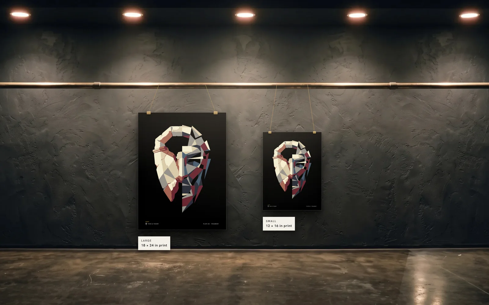The two sizes to scale on the same wall: an 18 × 24 in print beside a 12 × 16 in print of plate 08, Fragment.