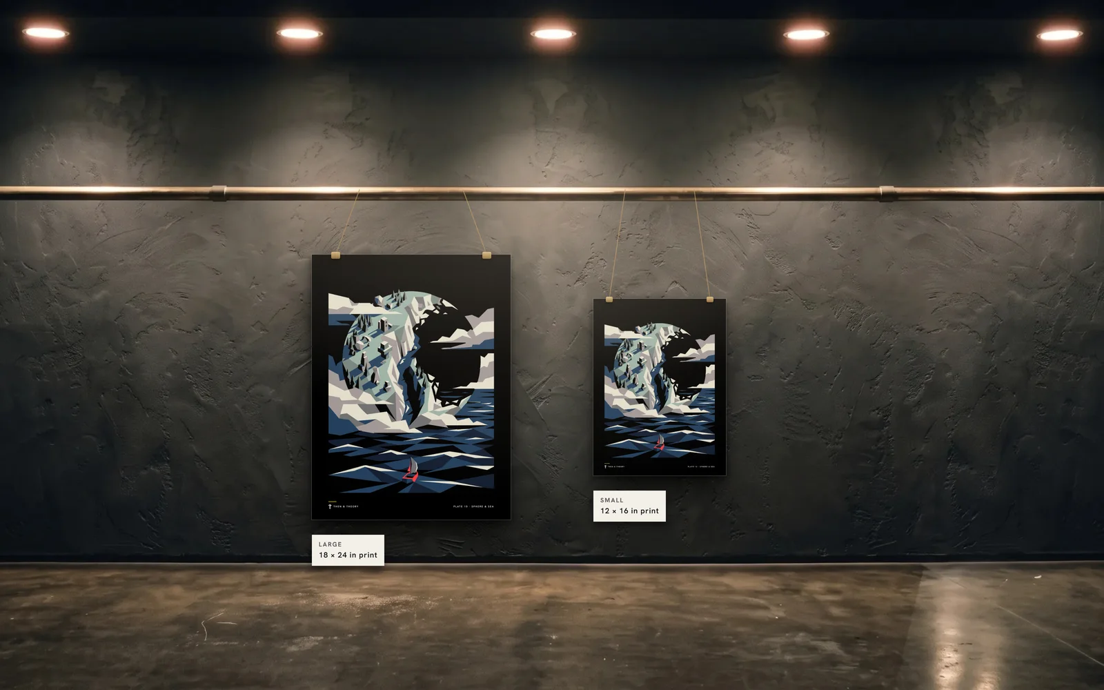 The two sizes to scale on the same wall: an 18 × 24 in print beside a 12 × 16 in print of plate 10, Sphere & Sea.